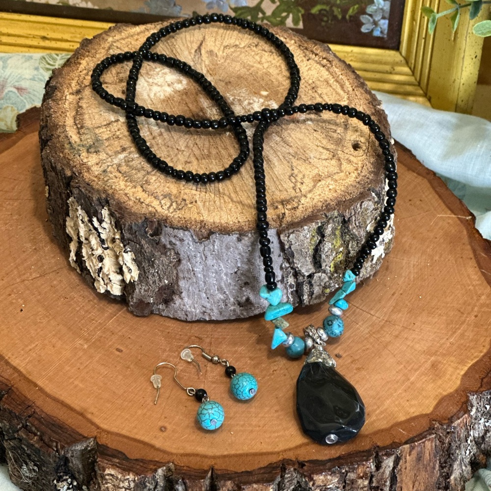 Beaded faux turquoise necklace with matching earrings.